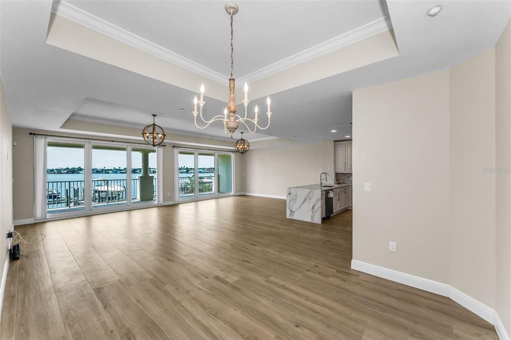 Chandelier, Empty room, Interior, Kitchen, Recessed Lighting, Water, Wood Texture Flooring
