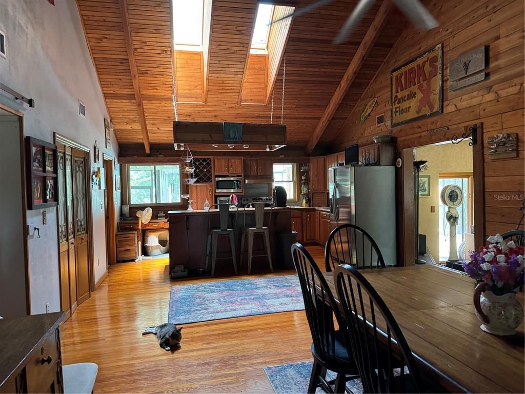 Dining room, Interior, Kitchen, Pendant Lights, Stainless Steel Appliances, Wooden Beams, Wooden Ceilings, Wood Texture Flooring, Wooden Walls