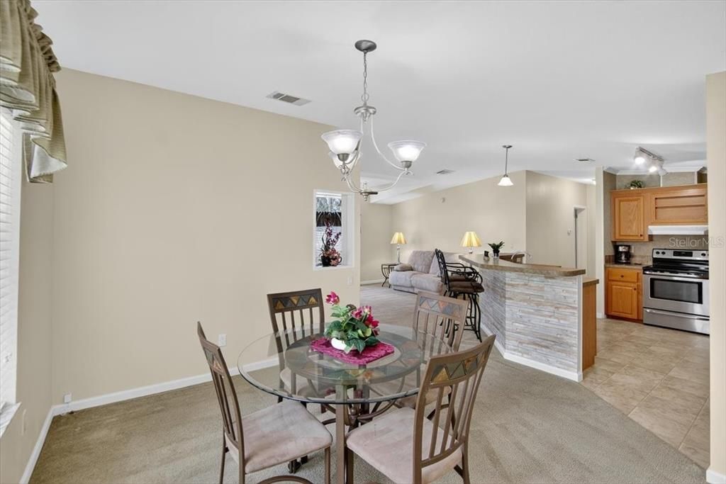 Chandelier, Dining room, Interior, Kitchen, Living room, Pendant Lights, Stainless Steel Appliances