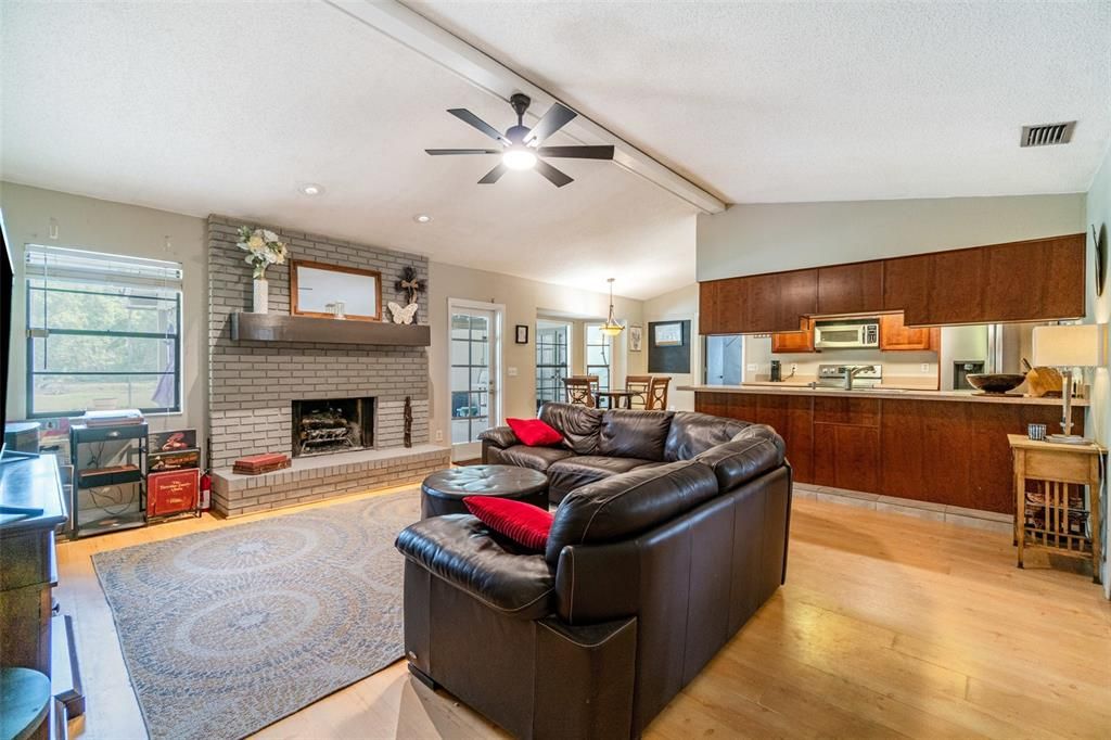 Dining room, Fireplace, Interior, Kitchen, Living room, Pendant Lights, Recessed Lighting, Wood Texture Flooring