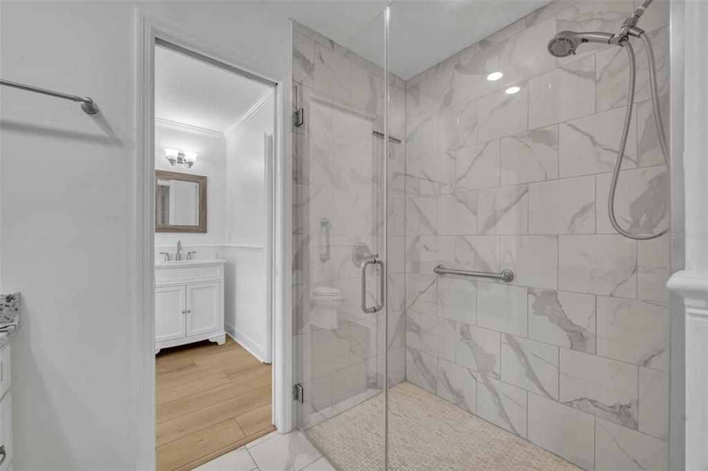 Bathroom, Glass Shower, Interior, Marble Walls, Wood Texture Flooring