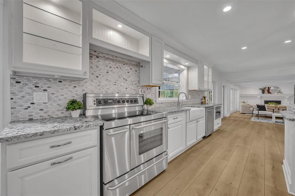 Dining room, Interior, Kitchen, Recessed Lighting, Stainless Steel Appliances, Wood Texture Flooring