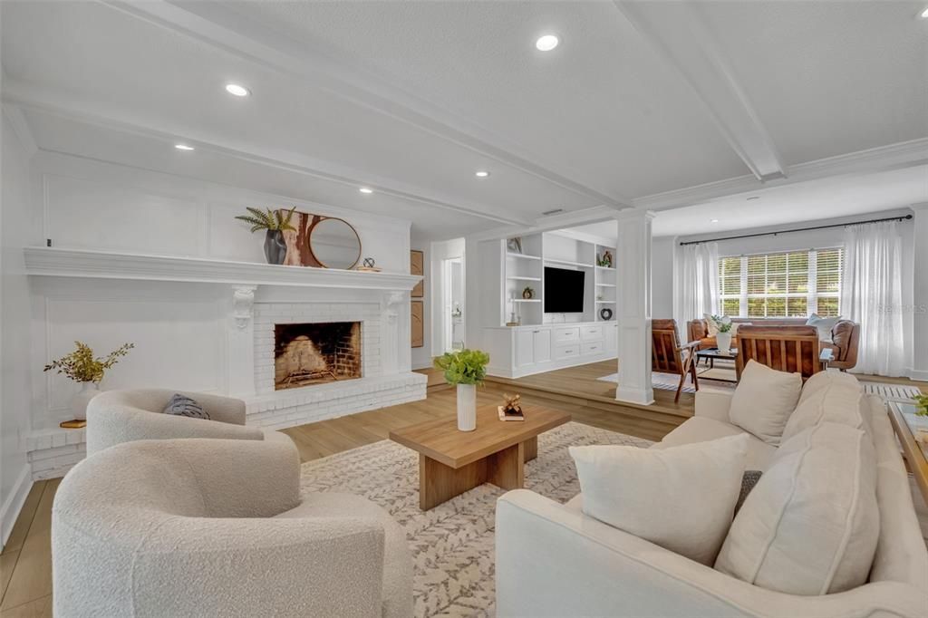 Dining room, Fireplace, Interior, Living room, Recessed Lighting, Wood Texture Flooring