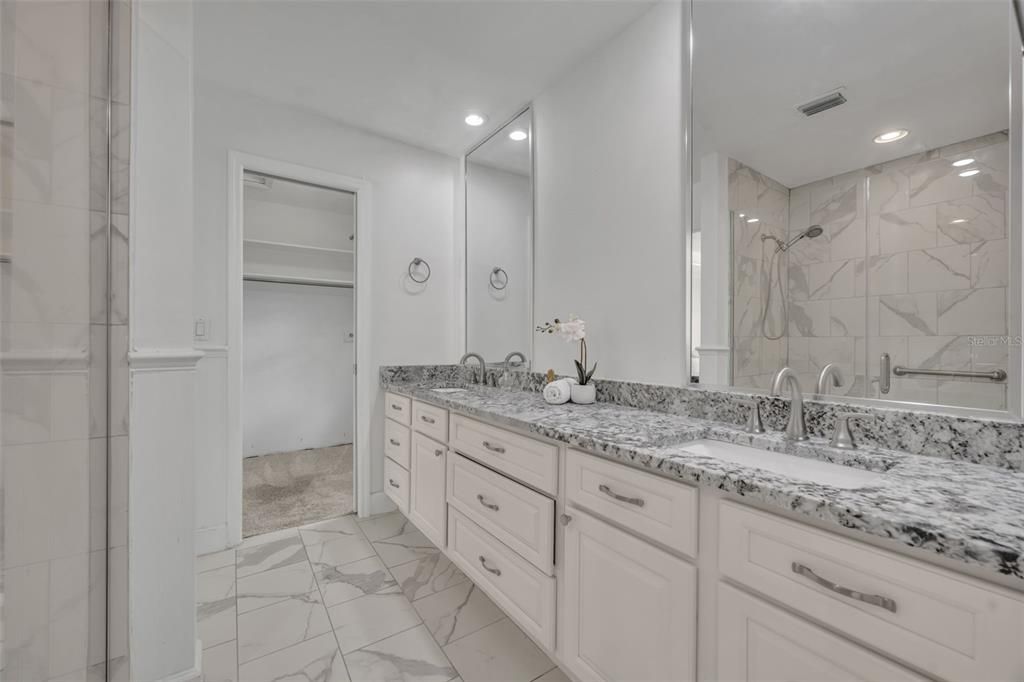 Bathroom, Dual Sink Vanities, Interior, Marble, Marble Walls, Recessed Lighting