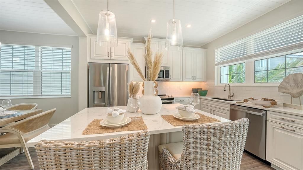Dining room, Interior, Kitchen, Pendant Lights, Recessed Lighting, Stainless Steel Appliances, Wood Texture Flooring