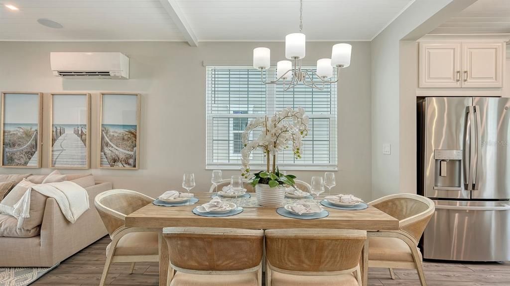 Chandelier, Dining room, Interior, Recessed Lighting, Stainless Steel Appliances, Wood Texture Flooring