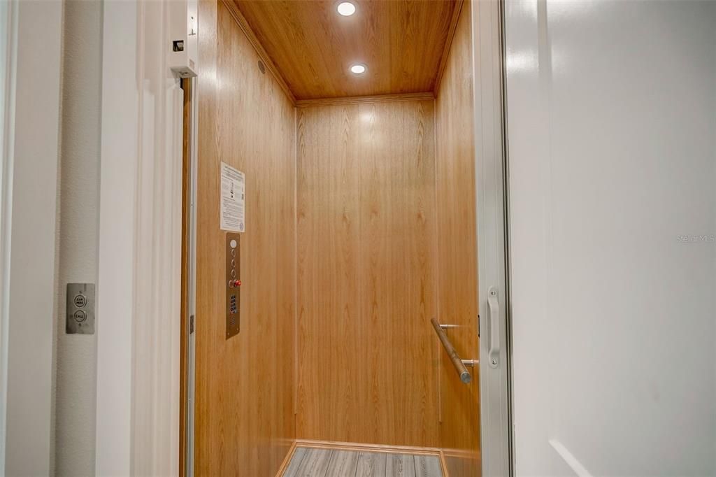 Elevator, Interior, Recessed Lighting, Wooden Ceilings, Wooden Walls
