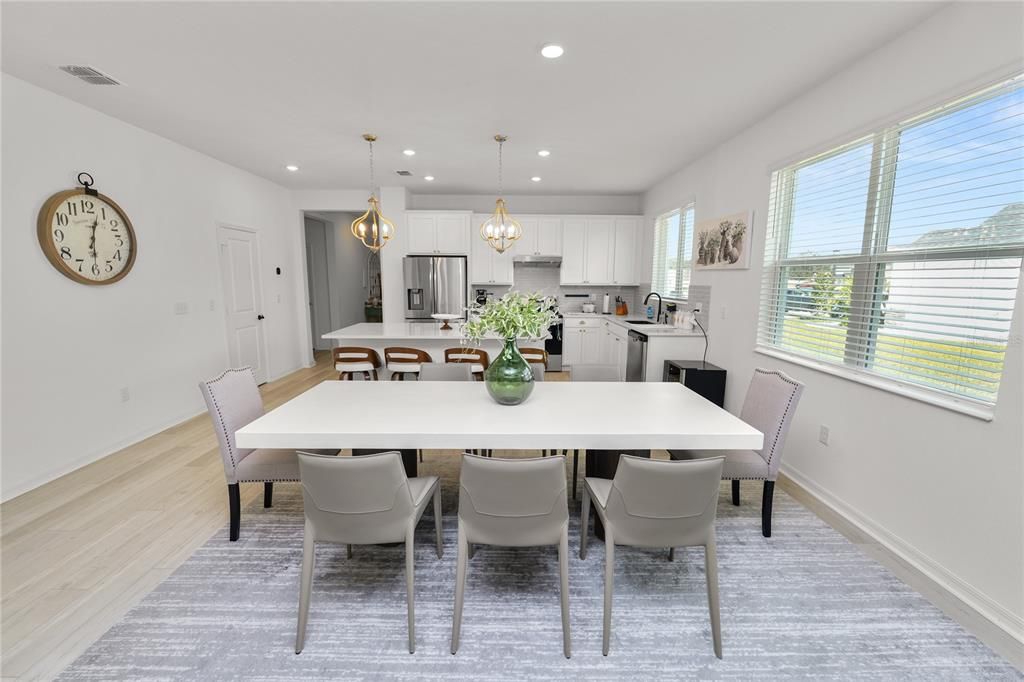 Dining room, Interior, Kitchen, Pendant Lights, Recessed Lighting, Stainless Steel Appliances, Wood Texture Flooring