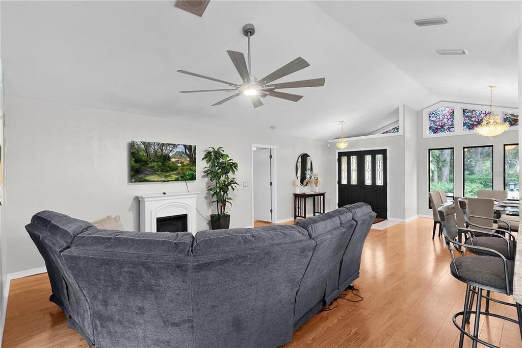 Dining room, Fireplace, Interior, Living room, Pendant Lights, Wood Texture Flooring