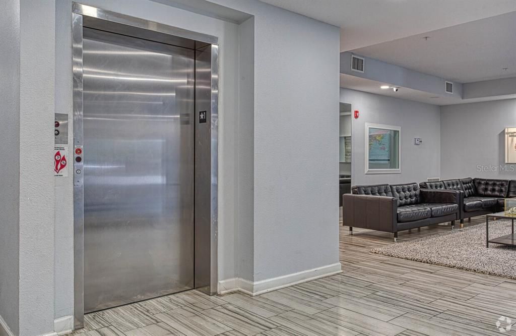 Elevator, Interior, Living room, Recessed Lighting, Wood Texture Flooring