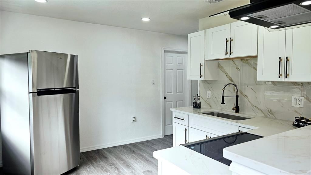Interior, Kitchen, Marble Walls, Recessed Lighting, Wood Texture Flooring