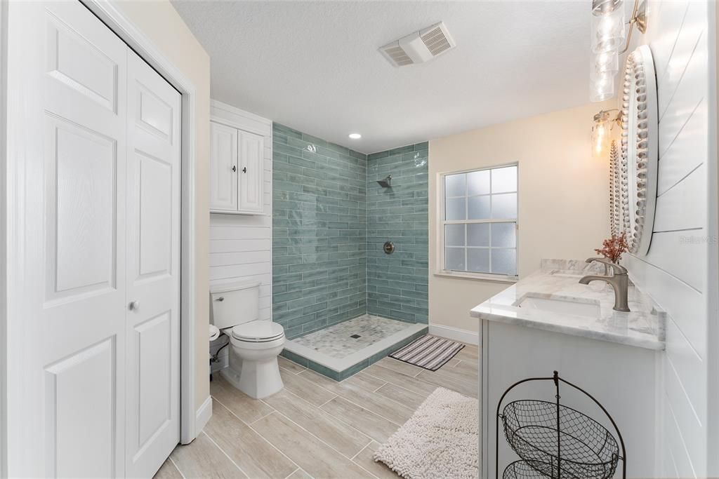 Bathroom, Glass Shower, Interior, Recessed Lighting, Wood Texture Flooring