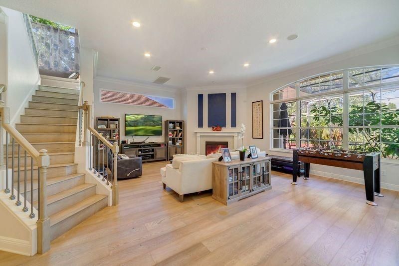 Fireplace, Interior, Living room, Piano, Recessed Lighting, Wood Texture Flooring