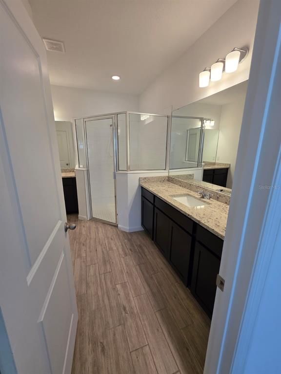 Bathroom, Glass Shower, Interior, Recessed Lighting, Wood Texture Flooring