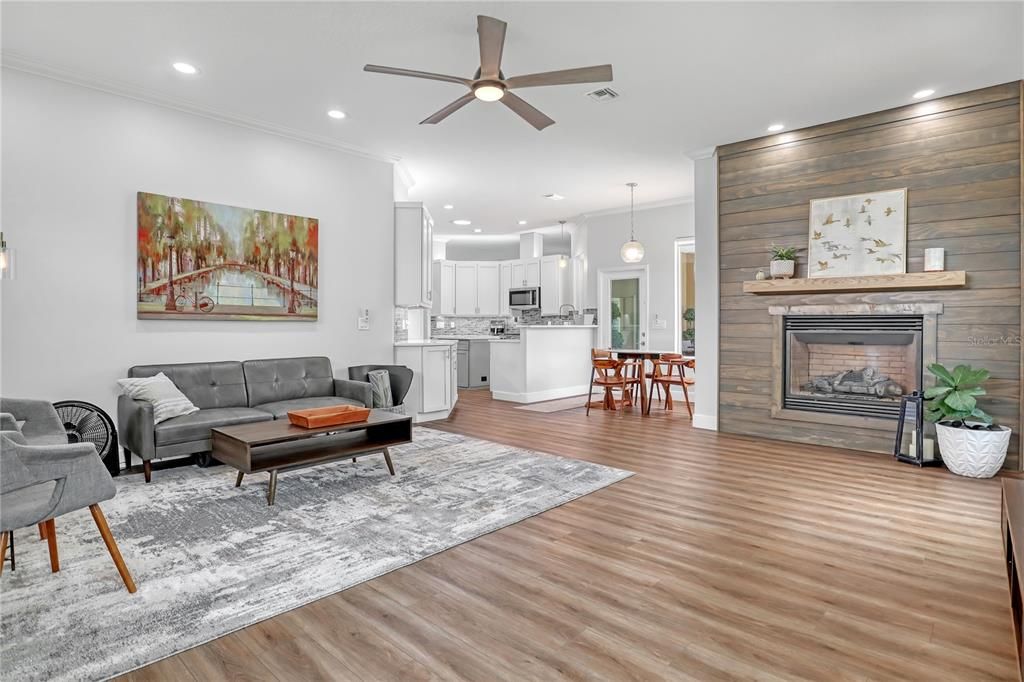 Dining room, Fireplace, Interior, Kitchen, Living room, Pendant Lights, Recessed Lighting, Wood Texture Flooring, Wooden Walls