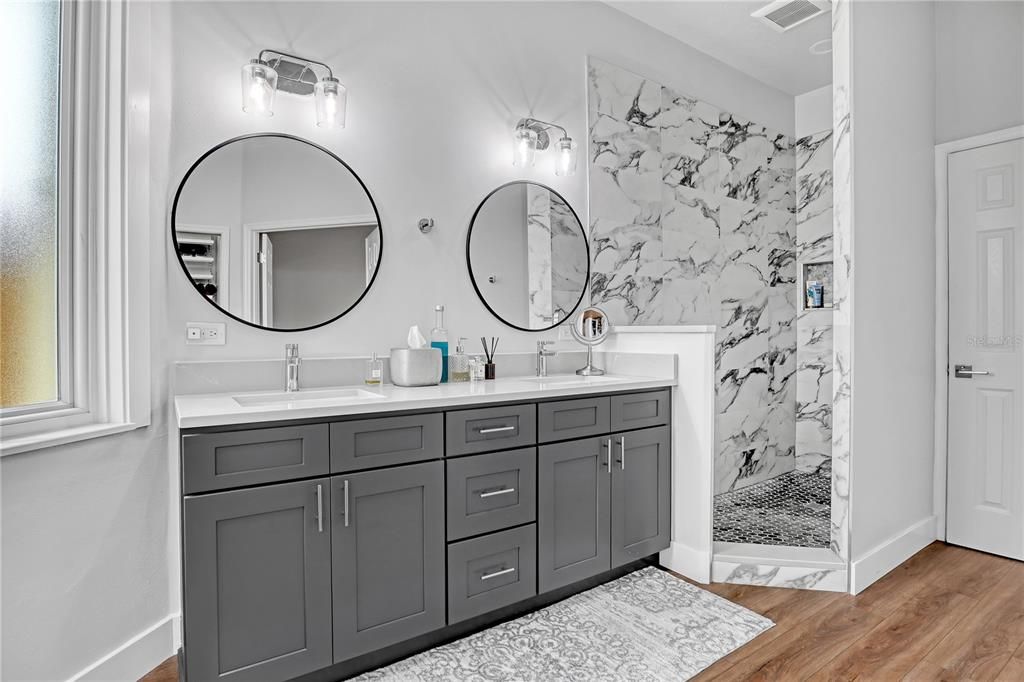 Bathroom, Dual Sink Vanities, Interior, Marble Walls, Wood Texture Flooring