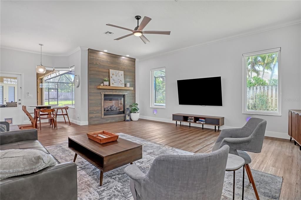 Dining room, Fireplace, Interior, Living room, Pendant Lights, Wood Texture Flooring, Wooden Walls