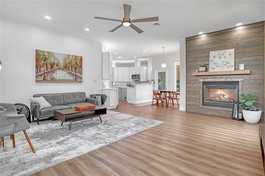 Dining room, Fireplace, Interior, Kitchen, Living room, Pendant Lights, Recessed Lighting, Wood Texture Flooring, Wooden Walls