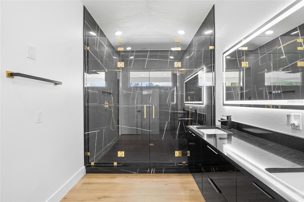 Bathroom, Dual Sink Vanities, Glass Shower, Interior, Recessed Lighting, Wood Texture Flooring