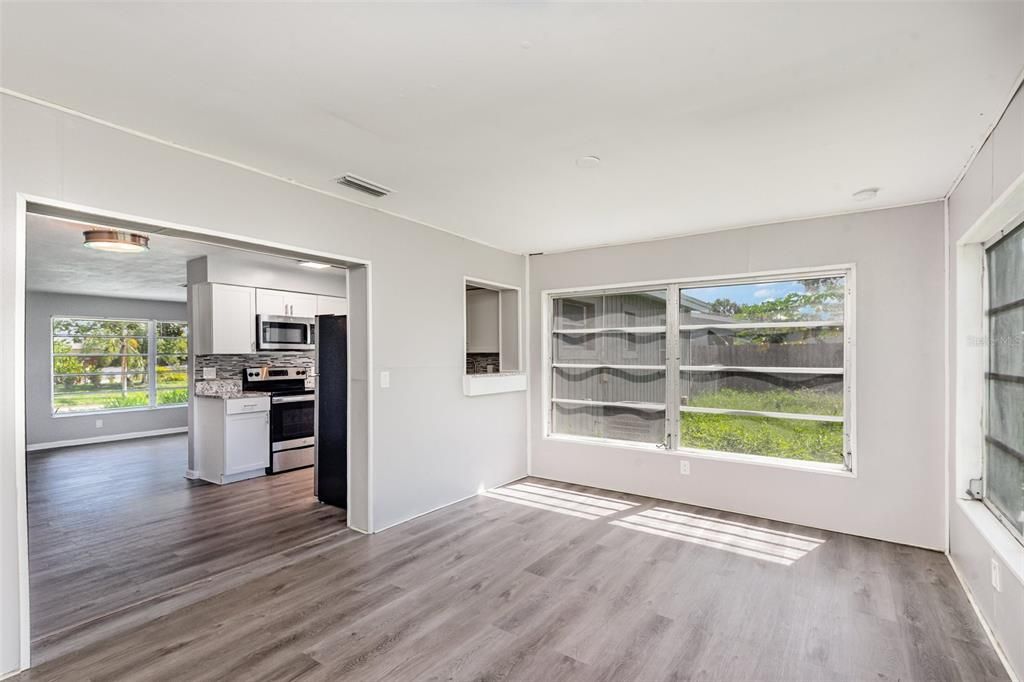 Empty room, Interior, Kitchen, Stainless Steel Appliances, Wood Texture Flooring