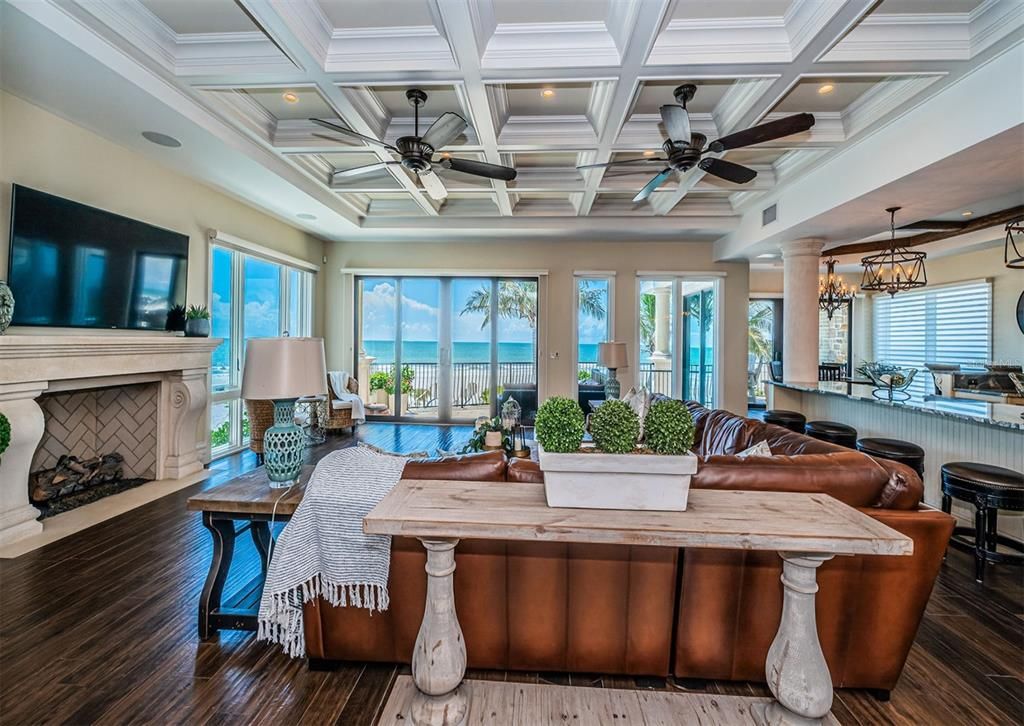 Dining room, Fireplace, Interior, Pendant Lights, Recessed Lighting, Water, Wood Texture Flooring