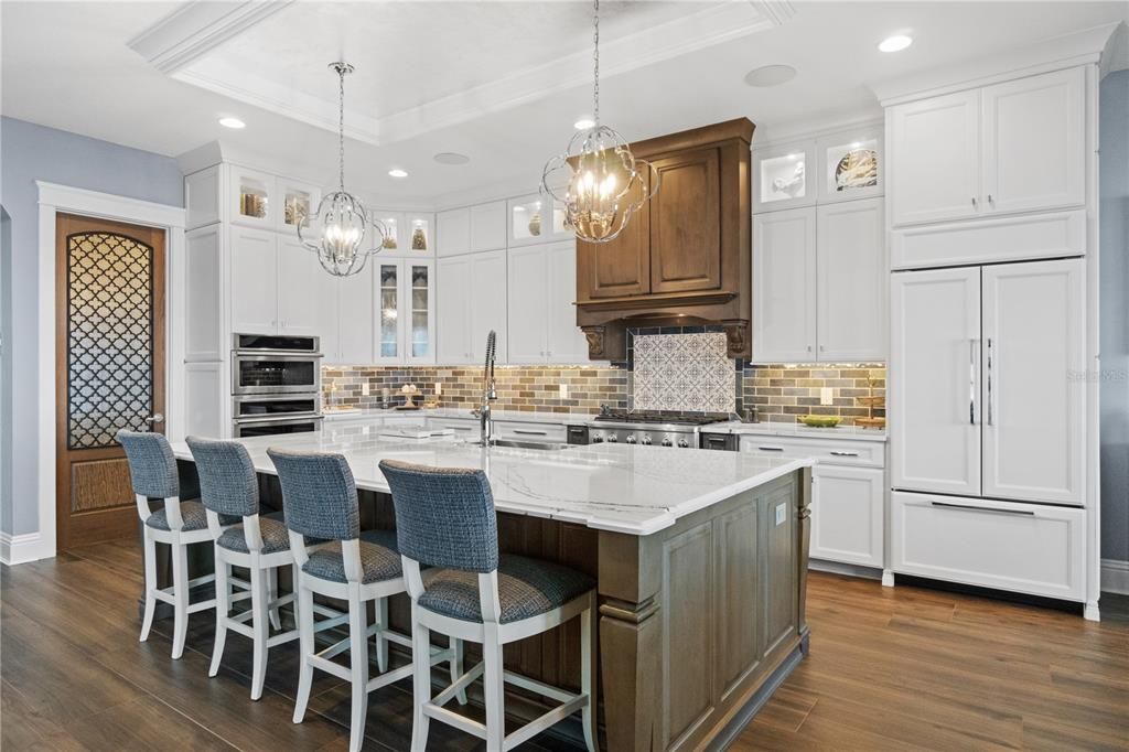 Chandelier, Interior, Kitchen, Pendant Lights, Recessed Lighting, Stainless Steel Appliances, Wood Texture Flooring