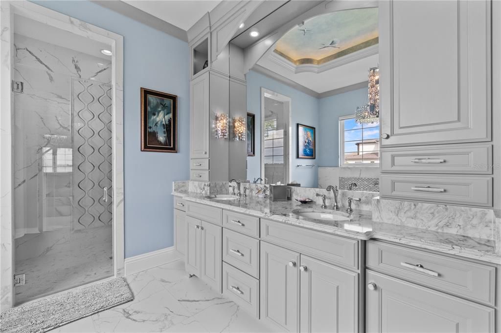 Bathroom, Dual Sink Vanities, Glass Shower, Interior, Marble, Marble Walls, Recessed Lighting