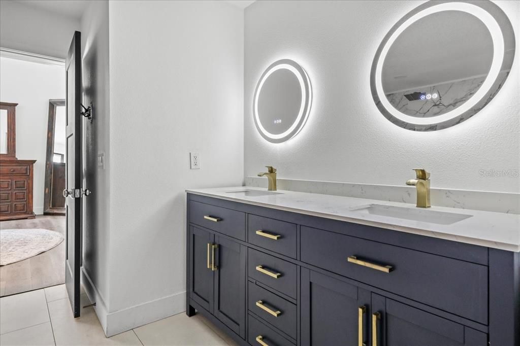 Bathroom, Dual Sink Vanities, Free Standing Baths, Interior, Marble Walls, Recessed Lighting
