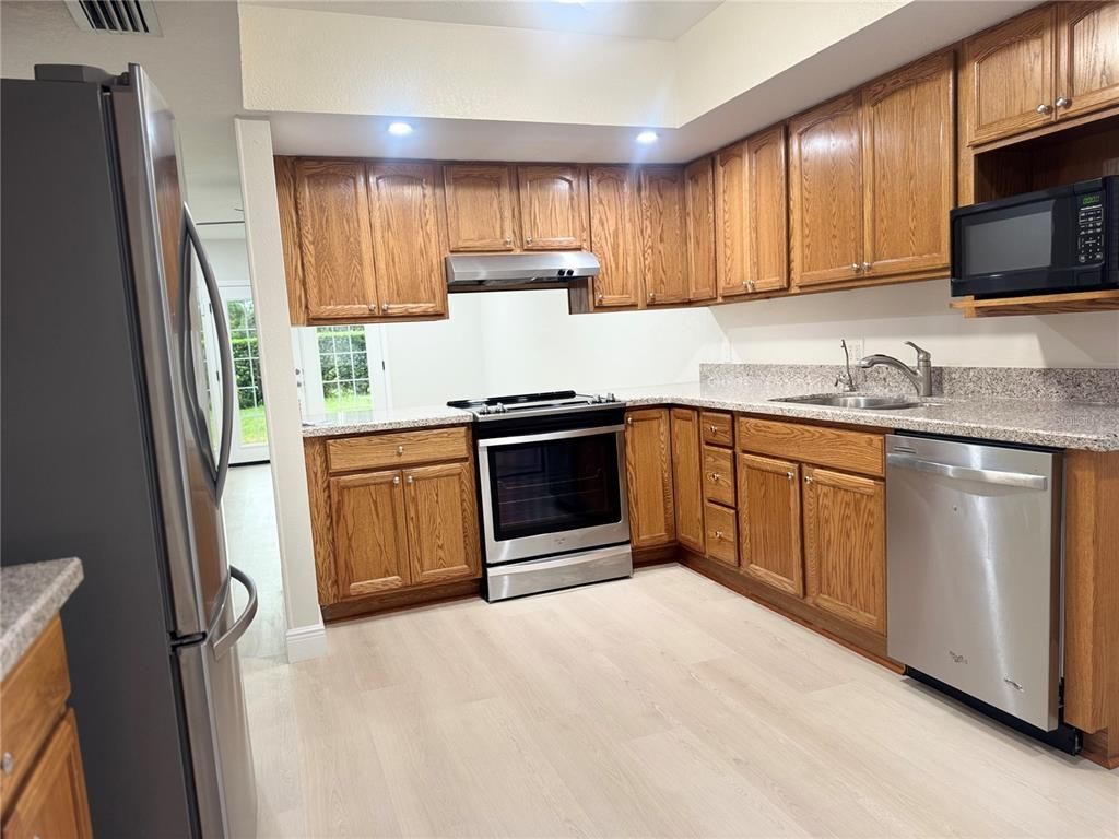 Interior, Kitchen, Recessed Lighting, Stainless Steel Appliances, Wood Texture Flooring