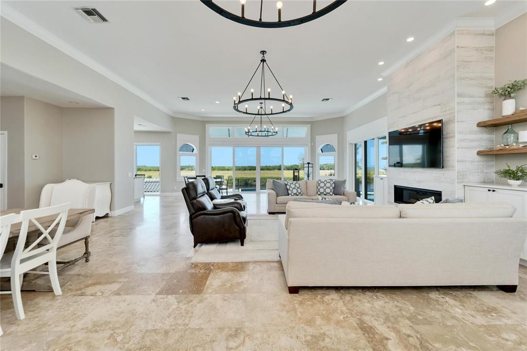 Chandelier, Dining room, Fireplace, Interior, Living room, Pendant Lights, Recessed Lighting, Water