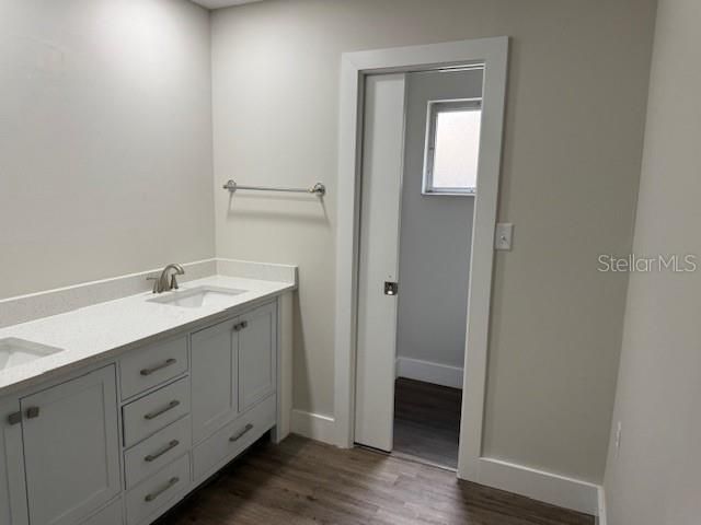 Bathroom, Dual Sink Vanities, Interior, Recessed Lighting, Wood Texture Flooring