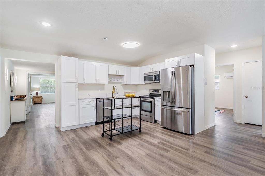 Interior, Kitchen, Recessed Lighting, Stainless Steel Appliances, Wood Texture Flooring