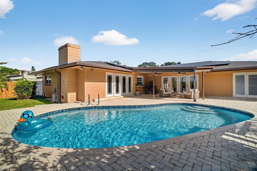 Exterior, Pool, Solar Panels