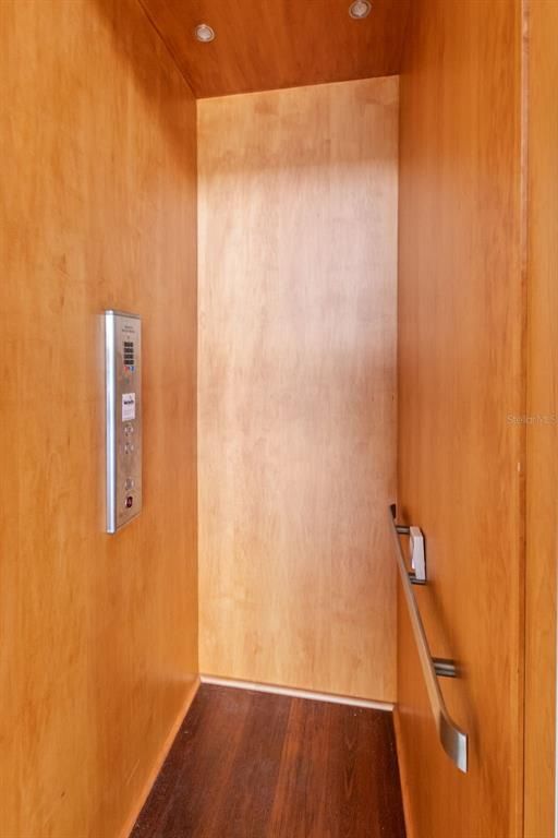 Elevator, Interior, Recessed Lighting, Wooden Ceilings, Wood Texture Flooring, Wooden Walls