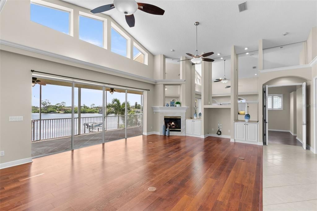 Fireplace, Interior, Pendant Lights, Recessed Lighting, Water, Wood Texture Flooring