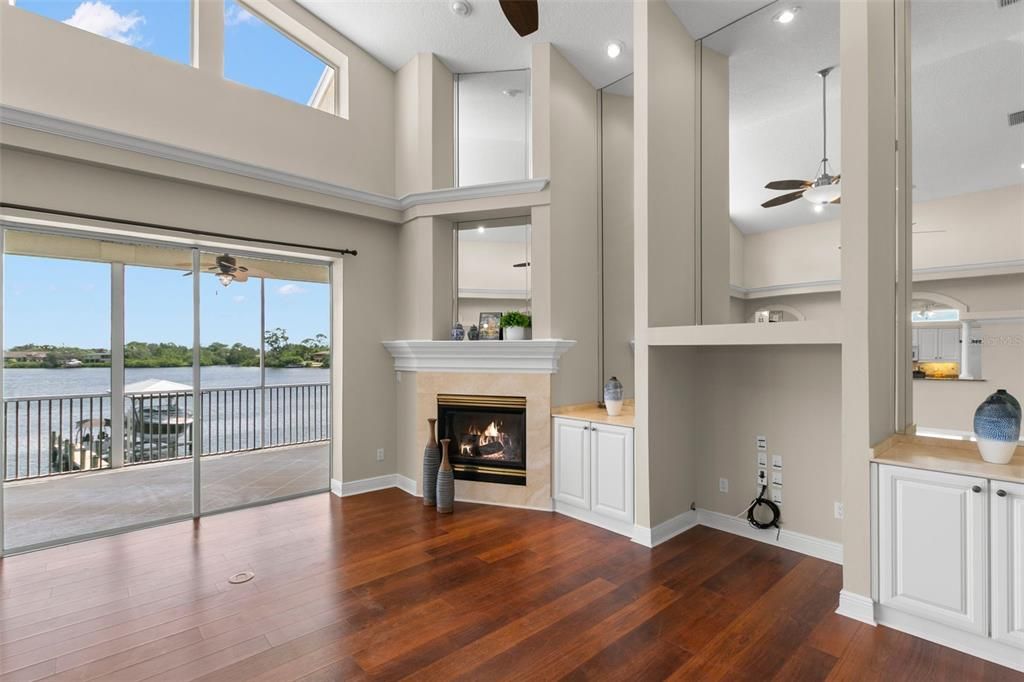 Fireplace, Interior, Recessed Lighting, Water, Wood Texture Flooring