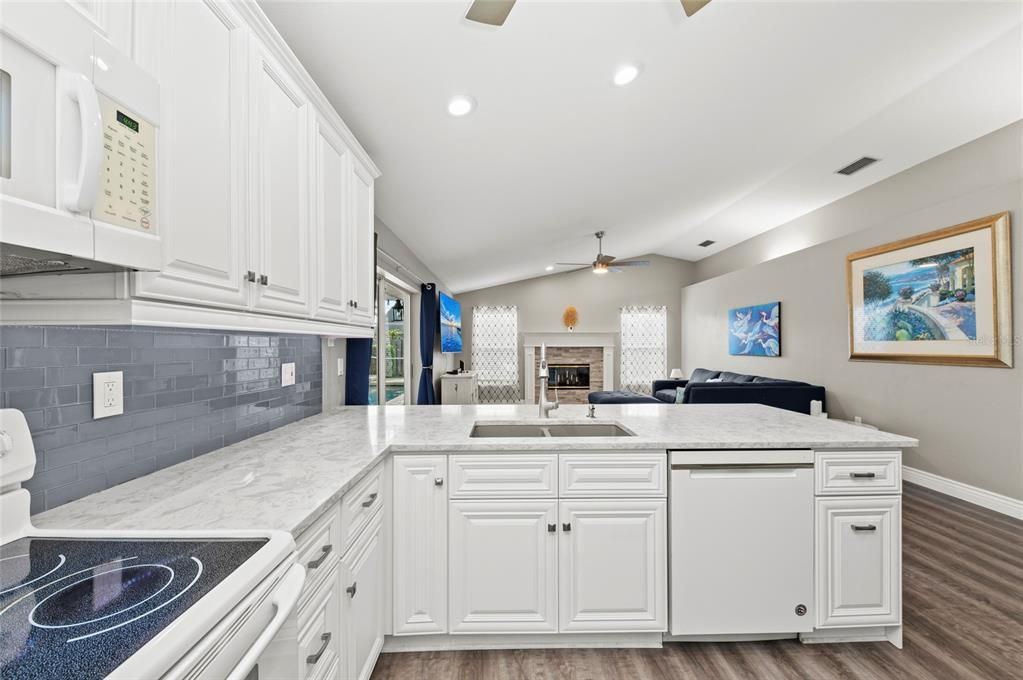 Fireplace, Interior, Kitchen, Recessed Lighting, Wood Texture Flooring