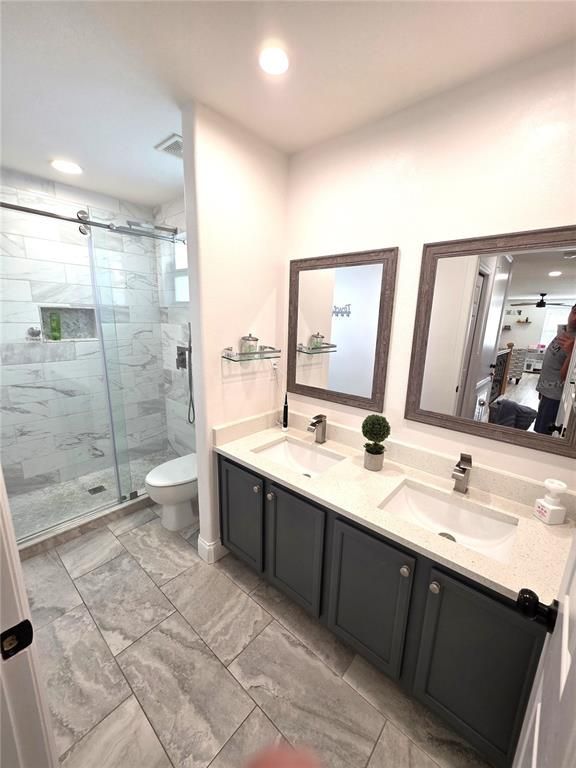 Bathroom, Dual Sink Vanities, Glass Shower, Interior, Marble Walls, Recessed Lighting