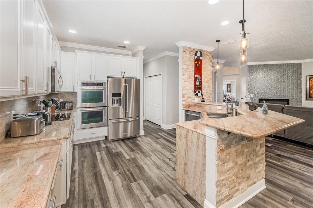 Interior, Kitchen, Pendant Lights, Recessed Lighting, Stainless Steel Appliances, Wood Texture Flooring