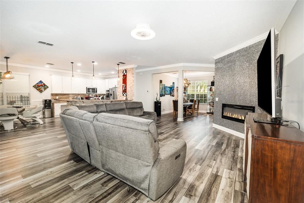 Dining room, Fireplace, Interior, Kitchen, Living room, Pendant Lights, Recessed Lighting, Wood Texture Flooring