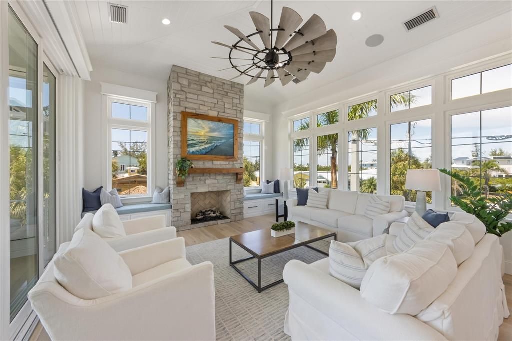 Fireplace, Interior, Living room, Recessed Lighting, Stone Walls, Wood Texture Flooring
