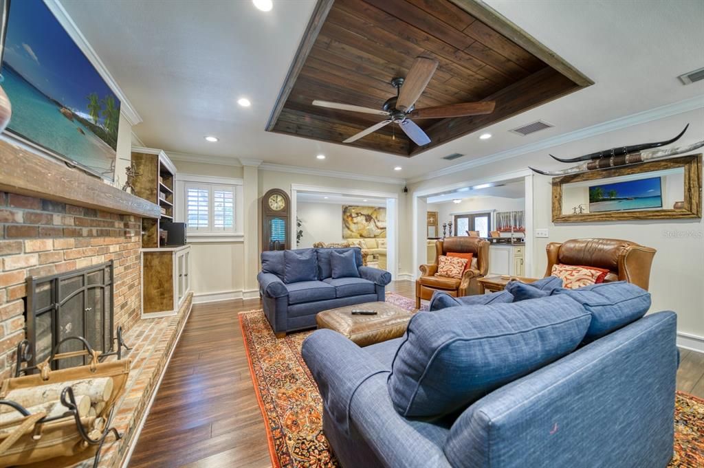 Fireplace, Interior, Living room, Recessed Lighting, Stone Walls, Wooden Ceilings, Wood Texture Flooring