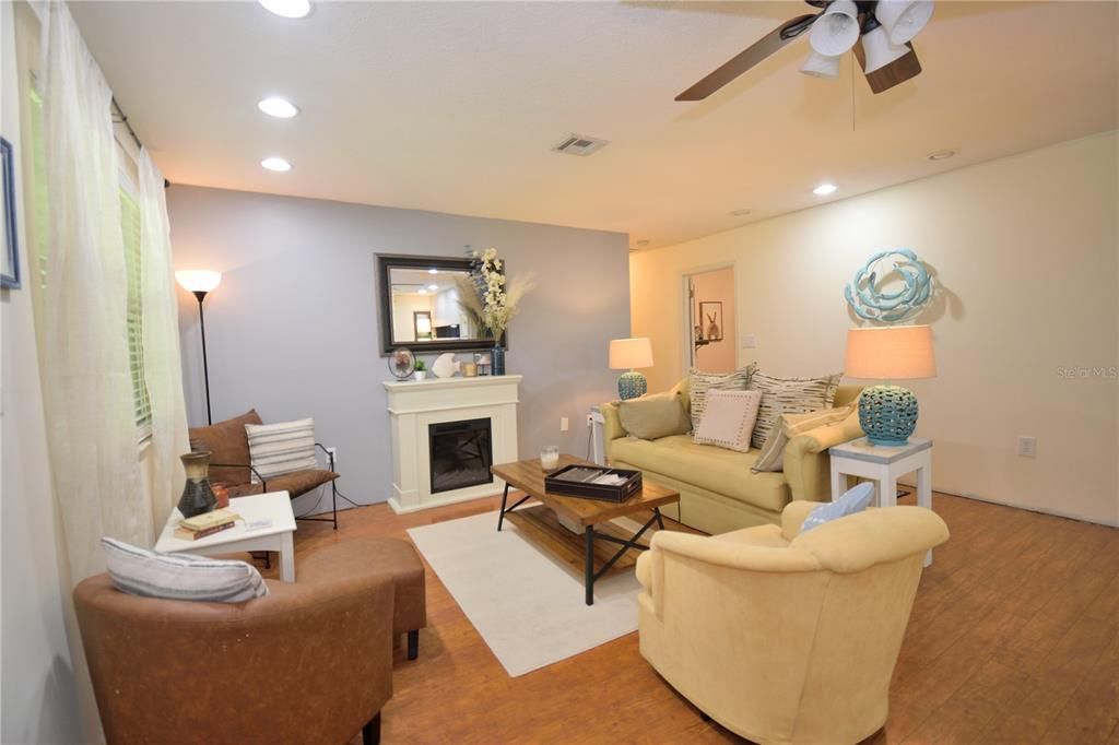 Fireplace, Interior, Living room, Recessed Lighting, Wood Texture Flooring