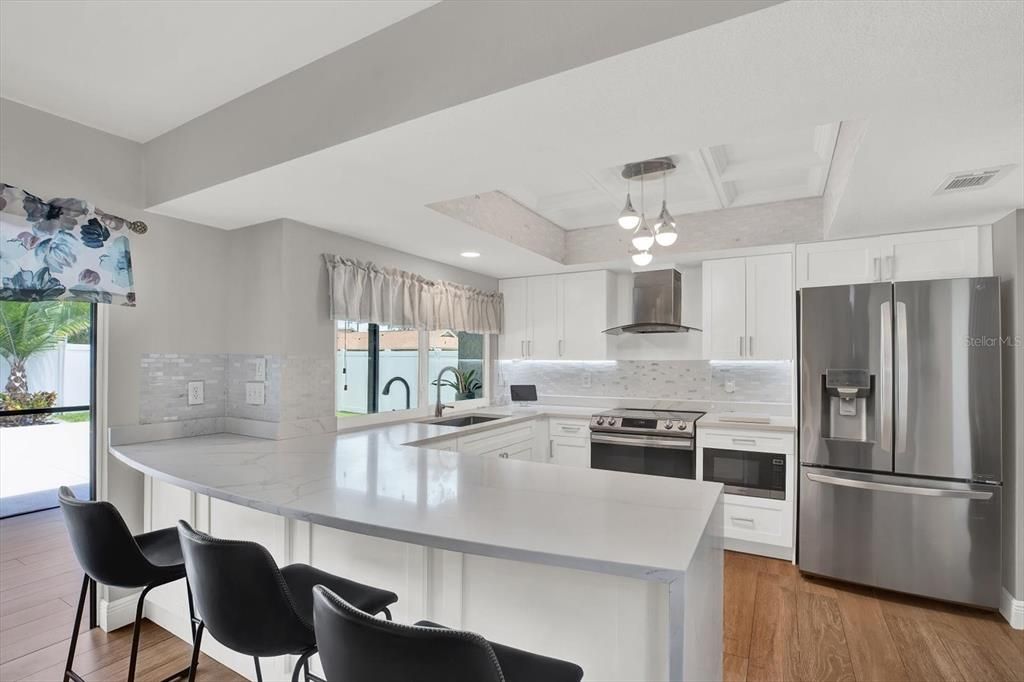 Interior, Kitchen, Pendant Lights, Recessed Lighting, Stainless Steel Appliances, Wood Texture Flooring