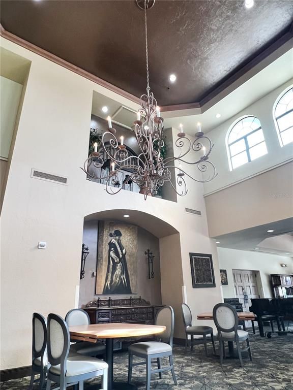 Chandelier, Dining room, Interior, Piano, Recessed Lighting