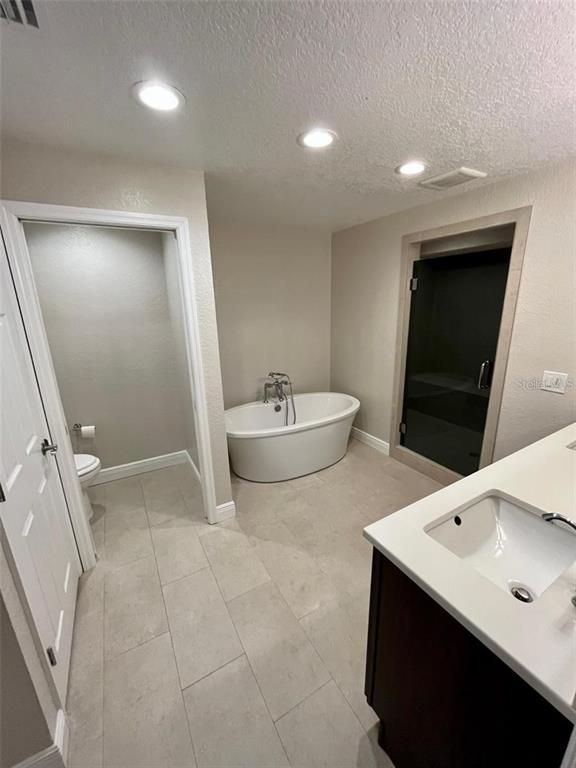Bathroom, Dual Sink Vanities, Free Standing Baths, Interior, Recessed Lighting