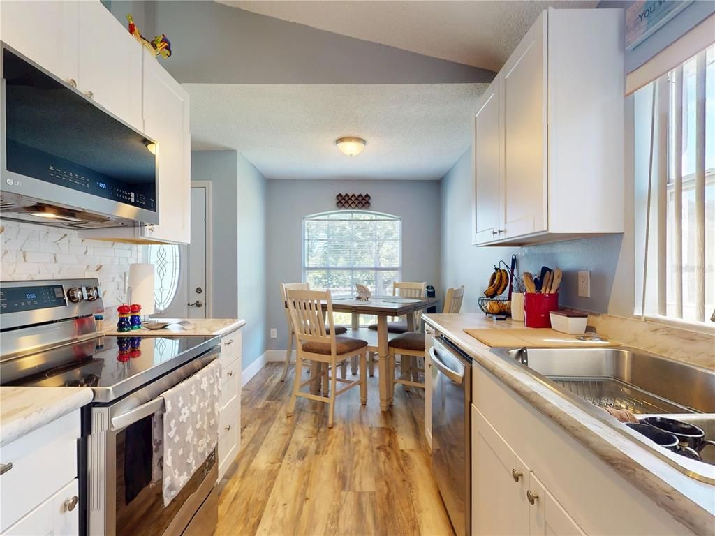 Dining room, Interior, Kitchen, Stainless Steel Appliances, Wood Texture Flooring
