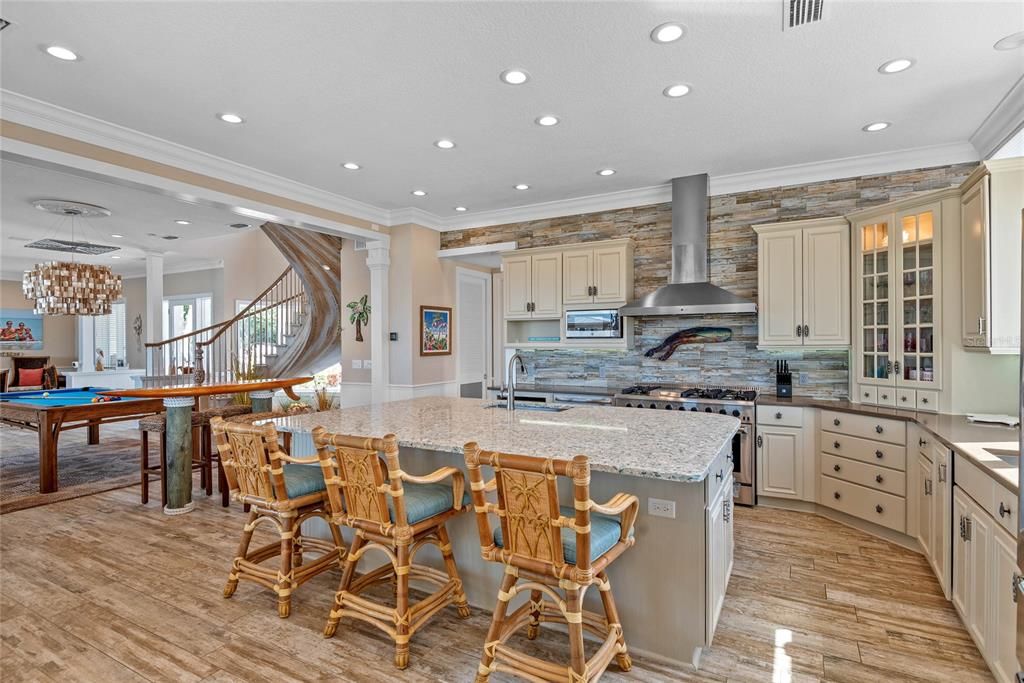 Chandelier, Interior, Kitchen, Recessed Lighting, Stainless Steel Appliances, Wood Texture Flooring