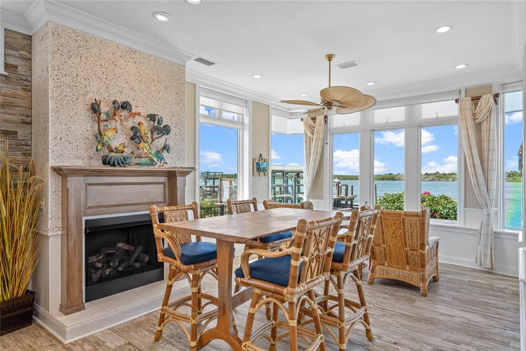 Dining room, Fireplace, Interior, Recessed Lighting, Water, Wood Texture Flooring