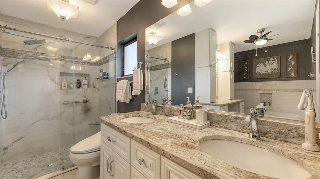 Bathroom, Dual Sink Vanities, Glass Shower, Interior, Marble Walls
